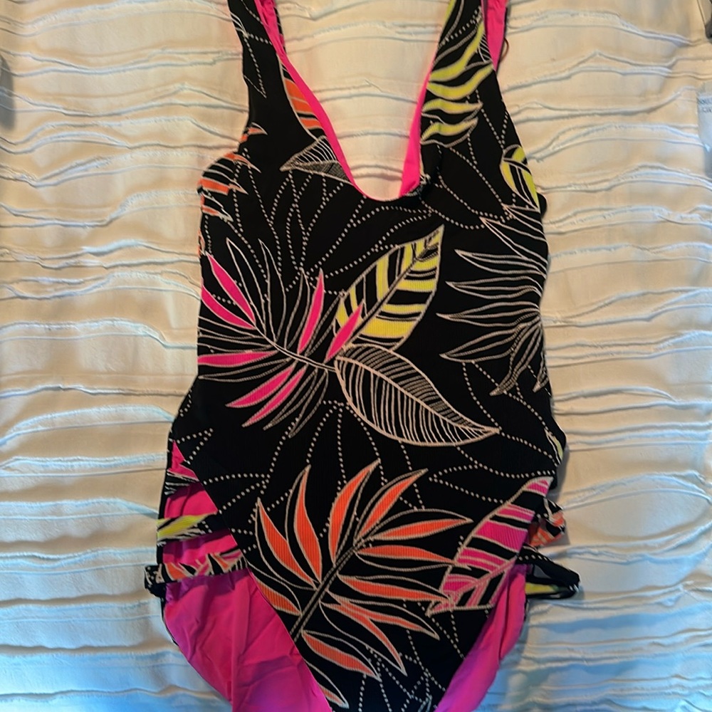 Becca size small one piece